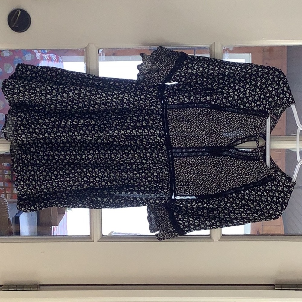 Peasant style dress in Rayon.  Side zipper at skirt